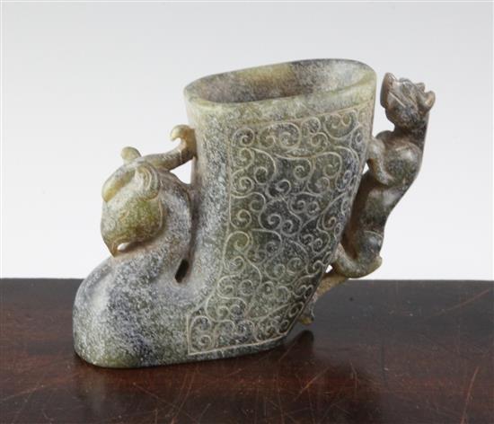 A Chinese archaistic green bowenite jade phoenix rhyton,